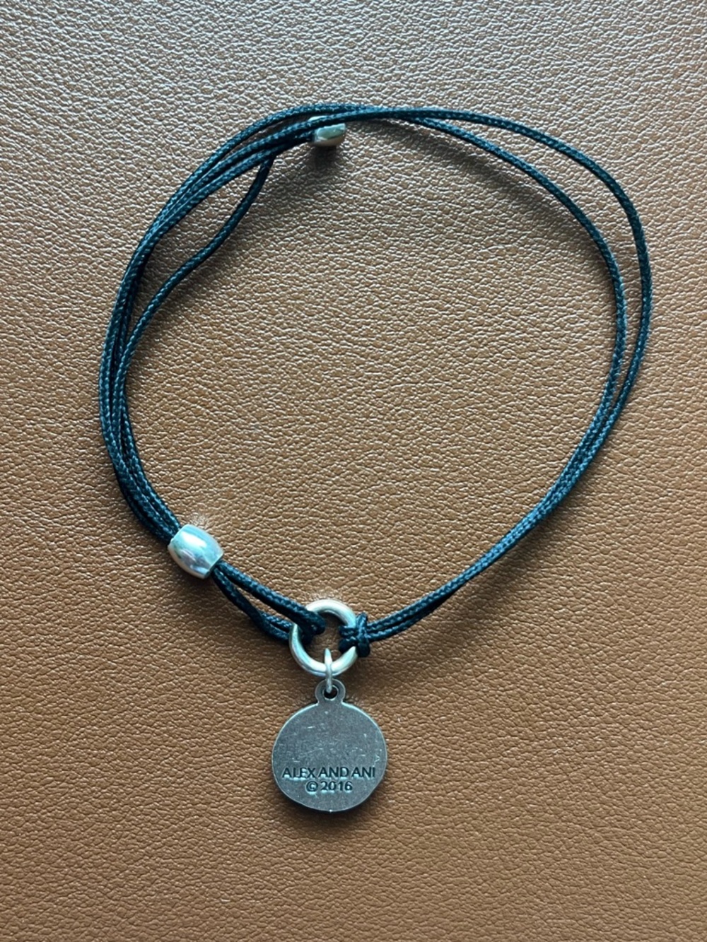 Alex and Ani Black Cord Bracelet with Silver Book Charm - Picture 2 of 2